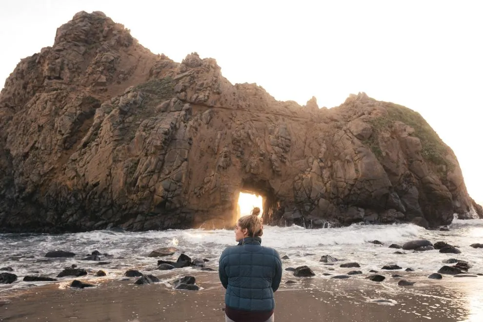nurse sitting on beach in California